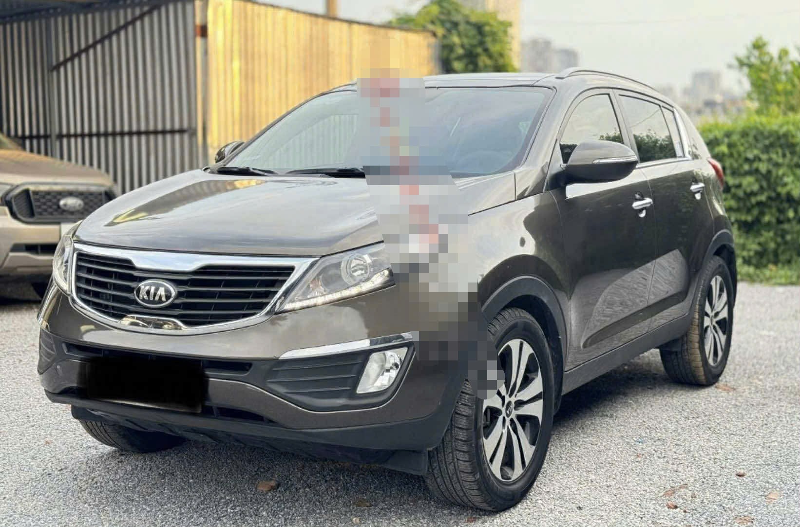 Kia Sportage 2.0 AT đời 2013 giá 392 triệu đồng đắt hay rẻ? - 2